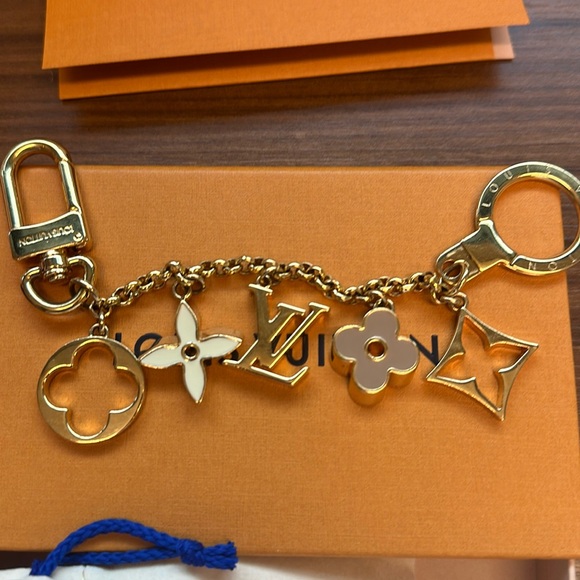 Louis Vuitton Accessories - Louis Vuitton purse charm. Gold and neutral colors
